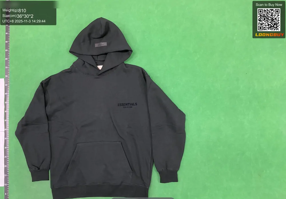 A hoodie photographed at the warehouse inspection bench